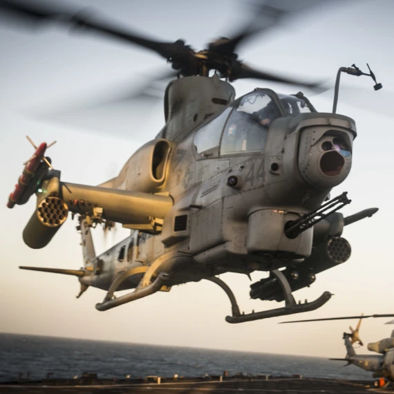 An AH-1Z Viper attack helicopter takes off from the flight deck aboard the amphibious dock landing ship USS Pearl Harbor (LSD 52).